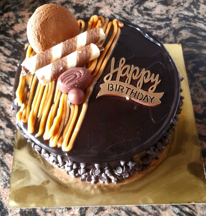 Mango cake frosting with mango ganache